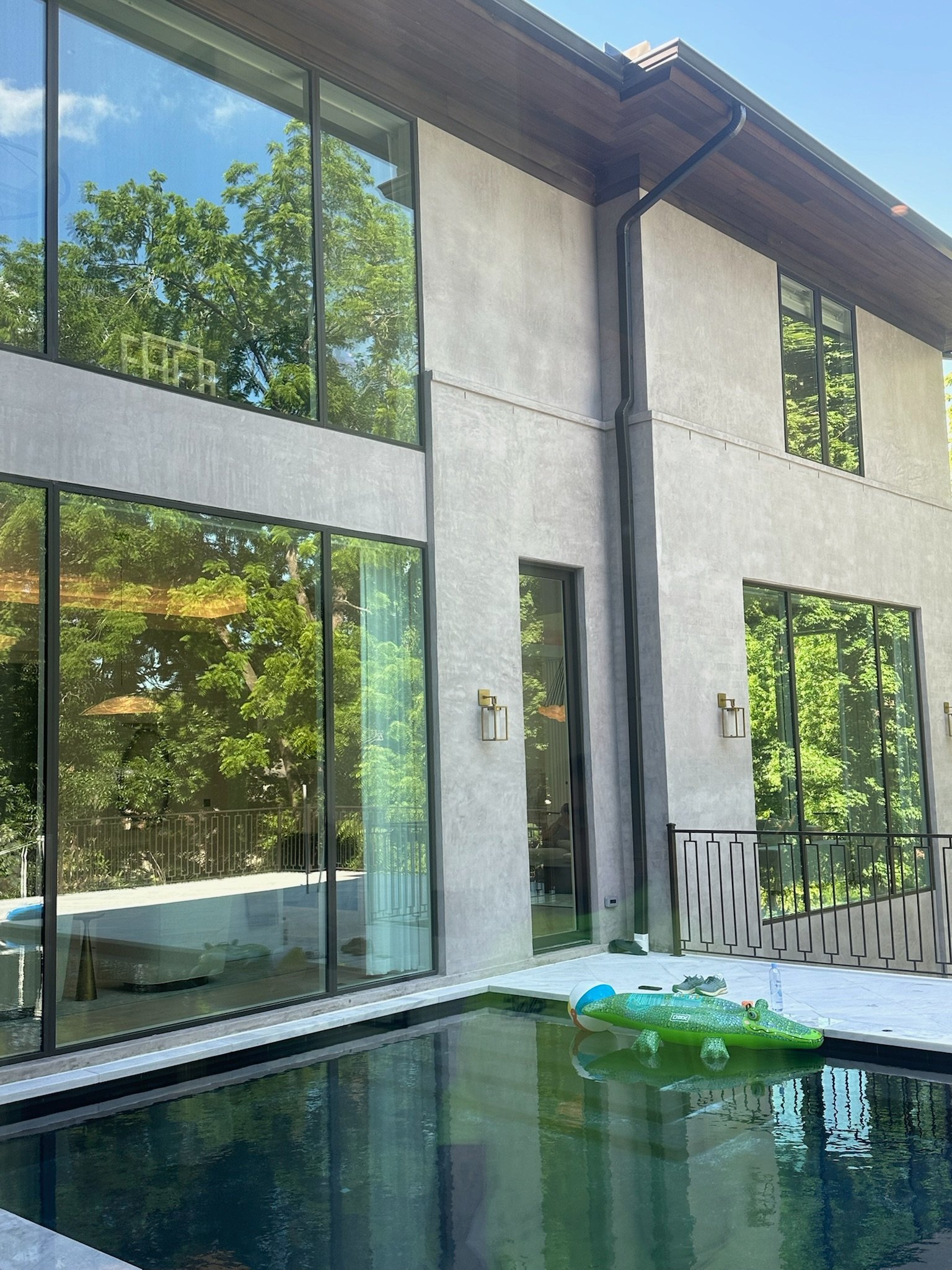 Architectural finishes beside a reflecting pool