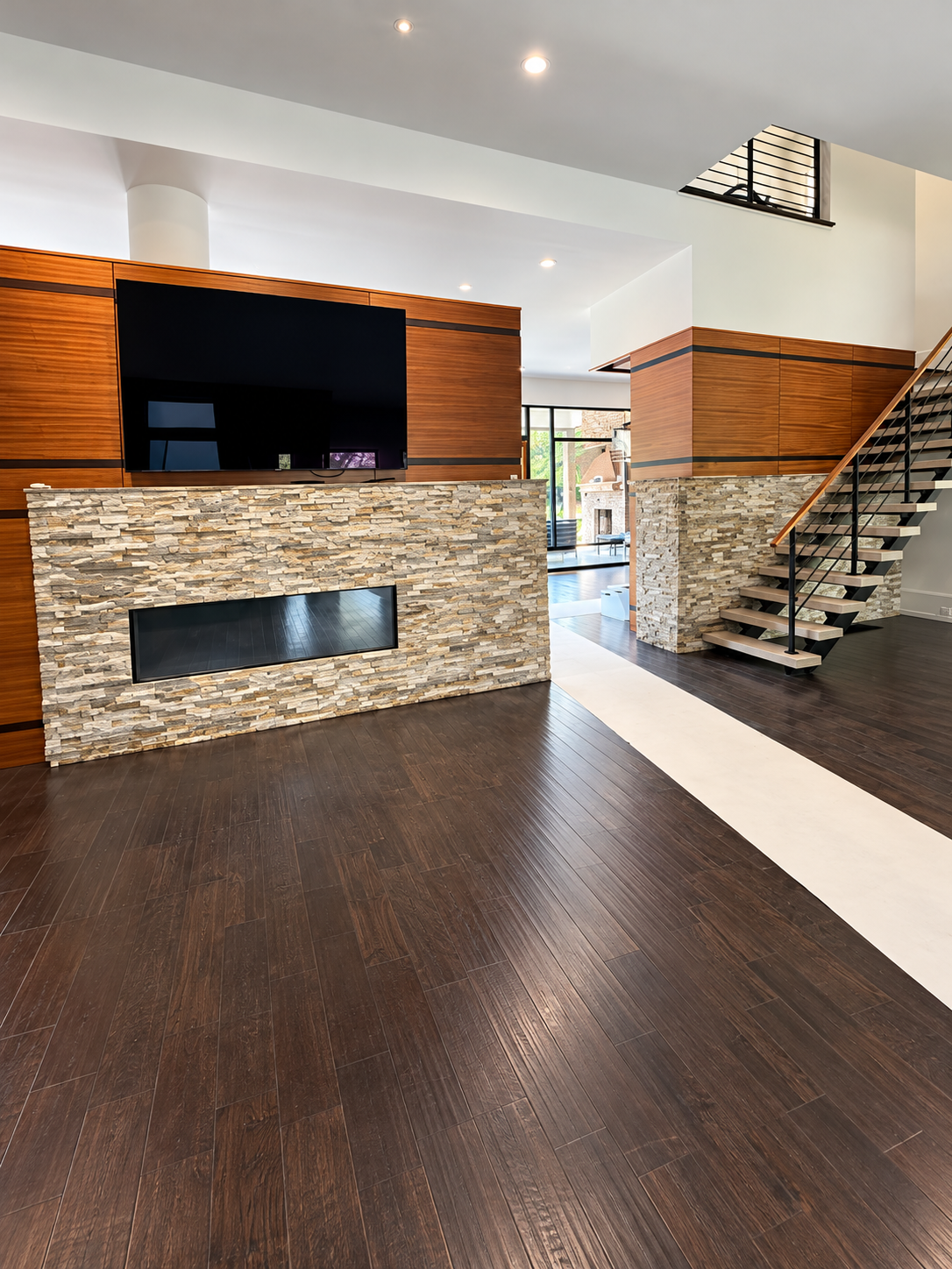 Wide view of the fireplace and staircase